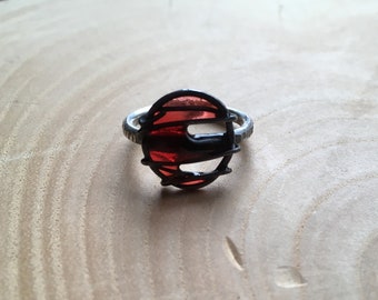 Red enamel and oxidised silver ring. Size J