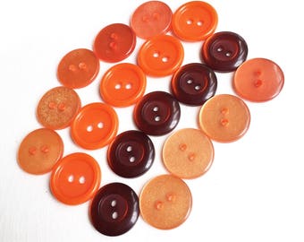 light peachy,dark orange, and burnt orange eco friendly buttons--three shades and styles--mixed lot of 19