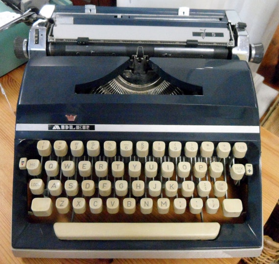 Adler Portable Typewriter Blue with new ribbon works great