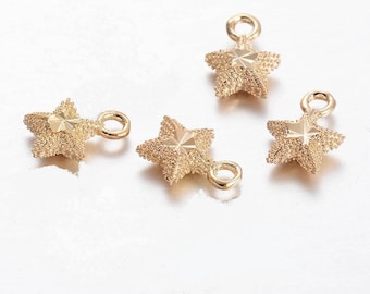 x 4 star 8 mm gold plated pendant.