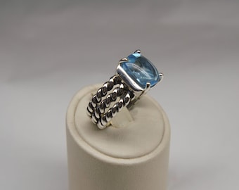 Silver and topaz ring