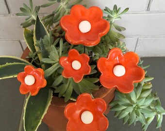 White ceramic and enamel orange flowers