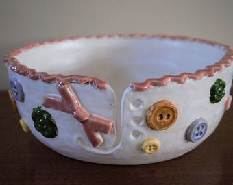 Buttons and a bow yarn bowl