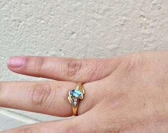 14k yellow gold oval aquamarine and diamond ring