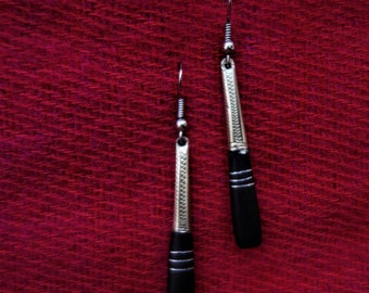 long silver colored and ebony wood earrings from Togo