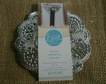 Set of 12 silver paper doilies, size 10.3 cm