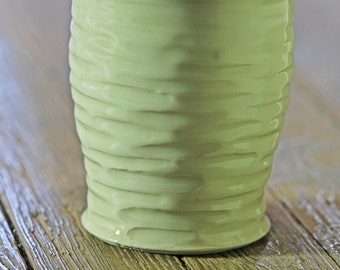 smaller carved porcelain vase