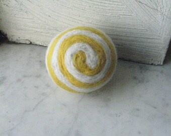 One multi-colored felted pin-cushion, Yellow and White