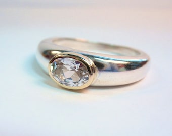 Simple Oval White Topaz Solitaire Ring