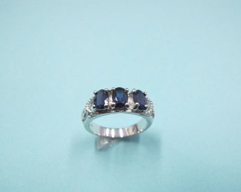 925 sterling silver ring with sapphire.