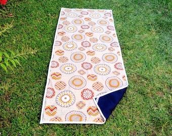 Yoga mat in colorful fabric. Mandalas and circles.