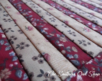 Small scrappy doll quilt - Red and gold floral