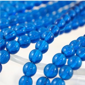 6mm Druk Pressed Beads-Capri Blue-Qty 25 (CZ 6R CB)