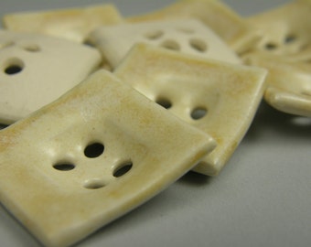 ceramic buttons--square--creamy white/orange