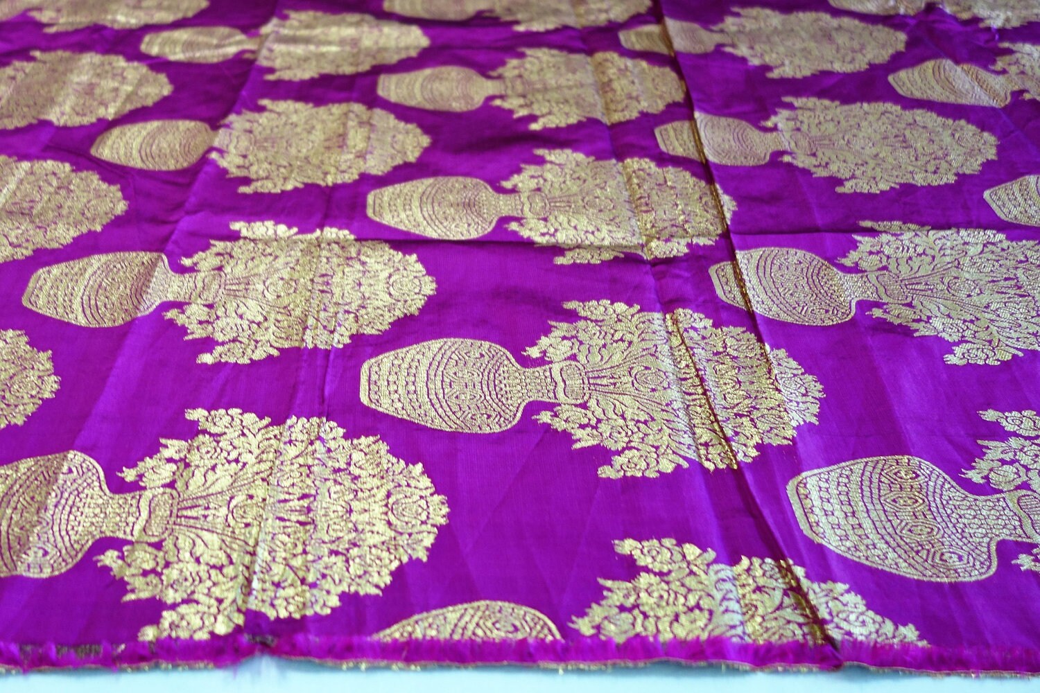 Fine art silk fabric in magenta with gold flower vase