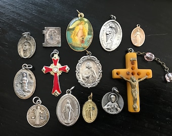 Vintage Lot of 13 Religious Items, Red Enamel Cross, Gold Bakelite Cross, St Benedict, St Jude, Lady Fatima, St Anthony, Miraculous Medal