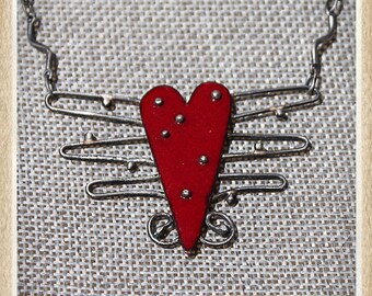 Hearts take flight sterling and enamel necklace.