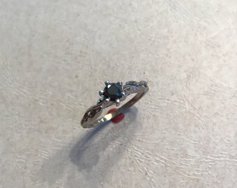 Silver ring with black diamond
