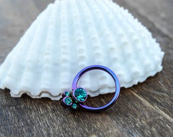 purple titanium bexel set cluster ring 16g (1.2mm) 3/8'' (10mm) daith ring, tragus ring, top ear helix, septum ring, eyebrow, emerald