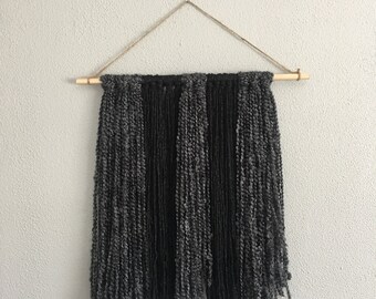 Black and charcoal wall hanging