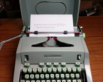 1968 Hermes 3000 portable typewriter with case lid
