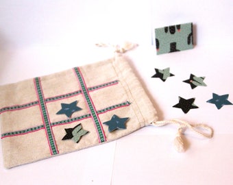 the Pouch "XIU" (tic tac toe)