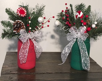 Christmas arrangements in painted mason jars