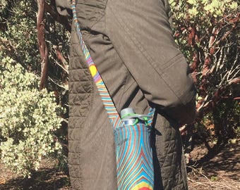Water bottle holder with shoulder strap