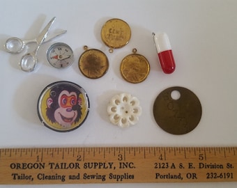 Vintage lot of 1950's to 1960's Crackerjack prizes, charms, tool tag and button all one price