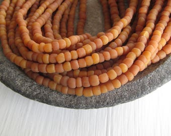 orange brown glass seed bead, matte barrel tube, small rustic ethnic spacer , indonesian 3 to 6mm, new indo-pacific (22 inches)7ab29-8
