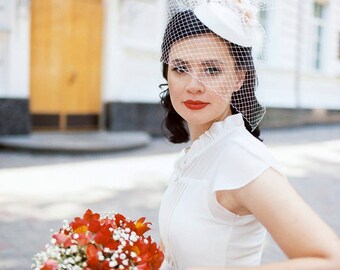Wedding hat-veil in retro style with silk flowers
