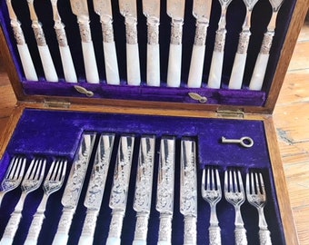 Antique Silver and Mother of Pearl Flatware Service for 12