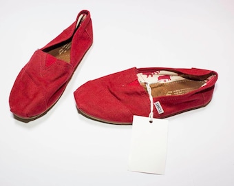 Toms red sneakers and a half number 37