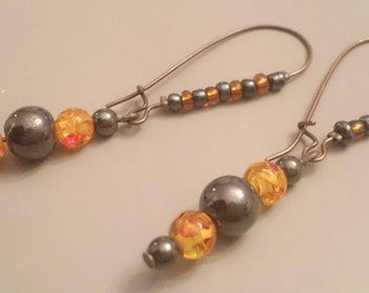 Earrings in copper and hematite beads
