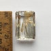 Emerald cut quartz gemstone with iron oxydes inclusions 19.15ct