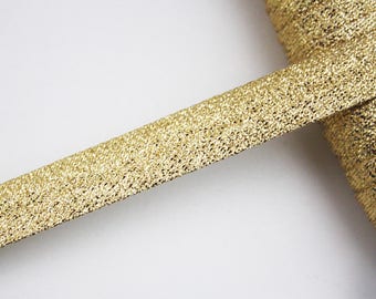 Glittery gold bias, 15 mm through pre-plissee universe