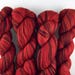 Superfine merino/ reclaimed yarn/ recycled/ hand dyed/ light fingering/ red/ tonal/ 100 per cent wool/ upcycled/ The Queen Of Hearts