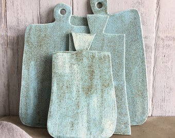 Cutting boards, serving plates in various sizes, prop for food photography