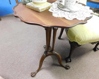 antique eagle clawfoot side table