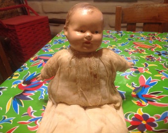 Vintage very old celluloid and cloth doll