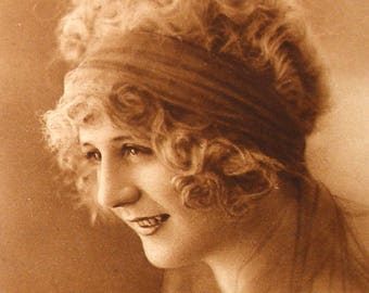 1900s French Postcard, Edwardian lady woth curly hair. RPPC real photo postcard, paper ephemera.