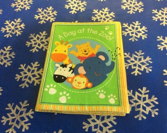 Cloth book. A Day at the Zoo.