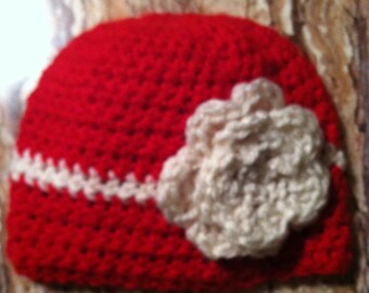 beanie hat with attached flower