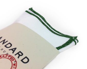 White Pocket Square serged with Green trim.
