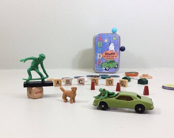 Kids treasure box with new tiny toys, vintage toy car & more for learning and imagination play. Personalize it with child's name on label.