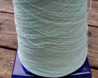 12.8 oz Light blue cone yarn - unknown fiber - nylon or polyester?