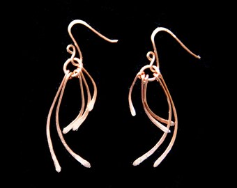 Earrings. Textured five paddle coated Copper wire earrings. Also available in coated Copper finishes and Sterling Silver.