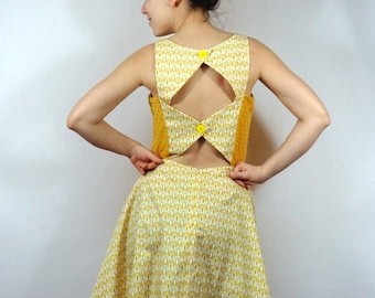Vintage woman yellow dress with halter