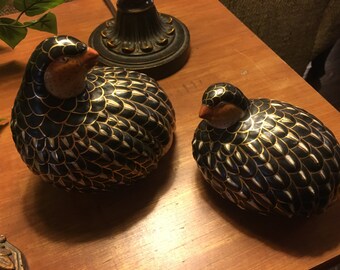 Beautiful hand-painted Guinea hens are bathed in gold and are artfully painted to show each detail of their faces and feathers.