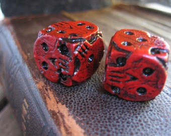 Hand cast red skull dice, oogie boogie dice, nightmare movie dice, collectable dice, gaming dice
